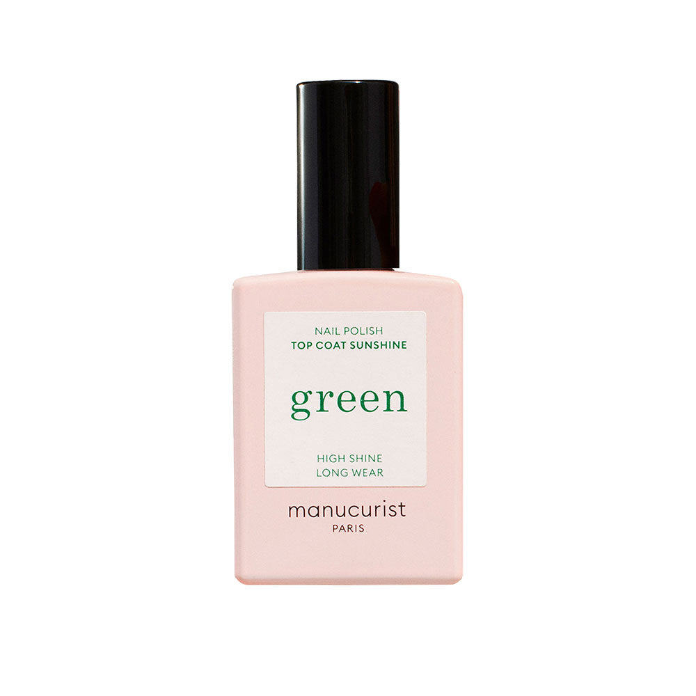 Bottle of The Manucurist's Top Coat Sunshine in front of white background.