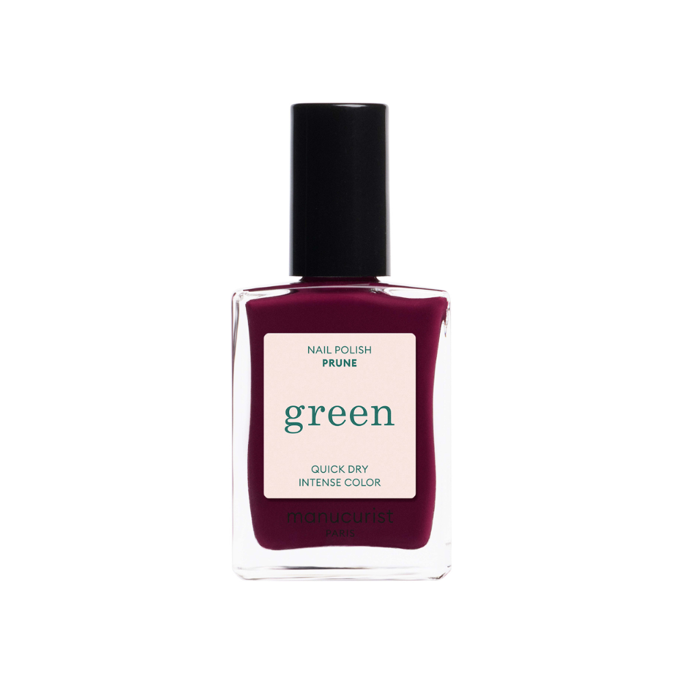 Manicurist Prune polish bottle with a black cap and pink label on a white background