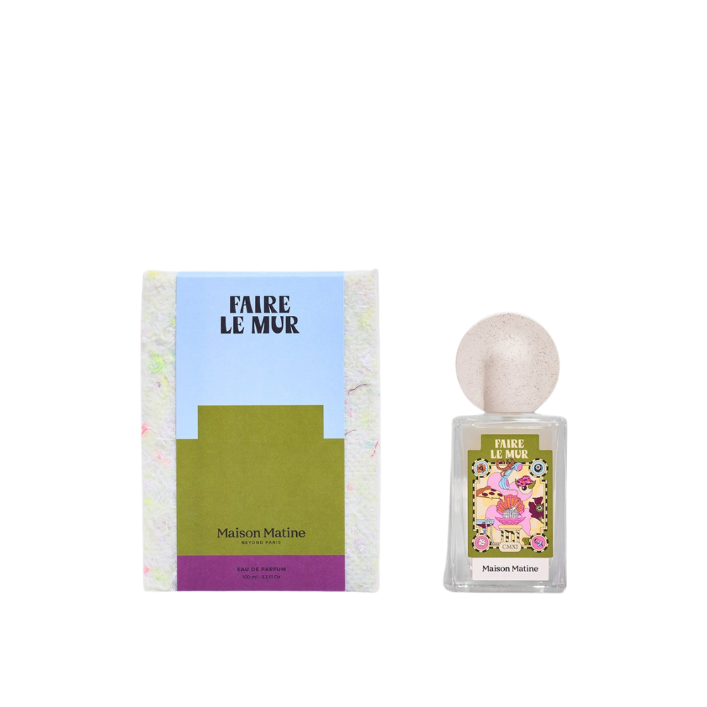 Perfume bottle and packaging with 'Faire Le Mur' branding on a white background