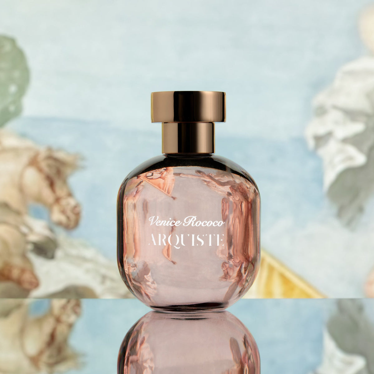 A bottle of Arquiste Venice Rococo perfume in front of a light painted background