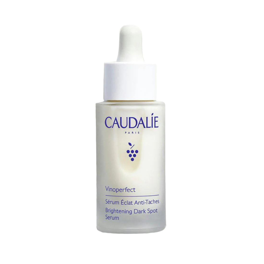 A white bottle with a dropper containing the Caudalie Vinoperfect Brightening Dark Spot Serum.