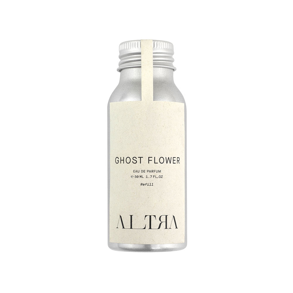 Silver bottle with white label reading GHOST FLOWER on a white background