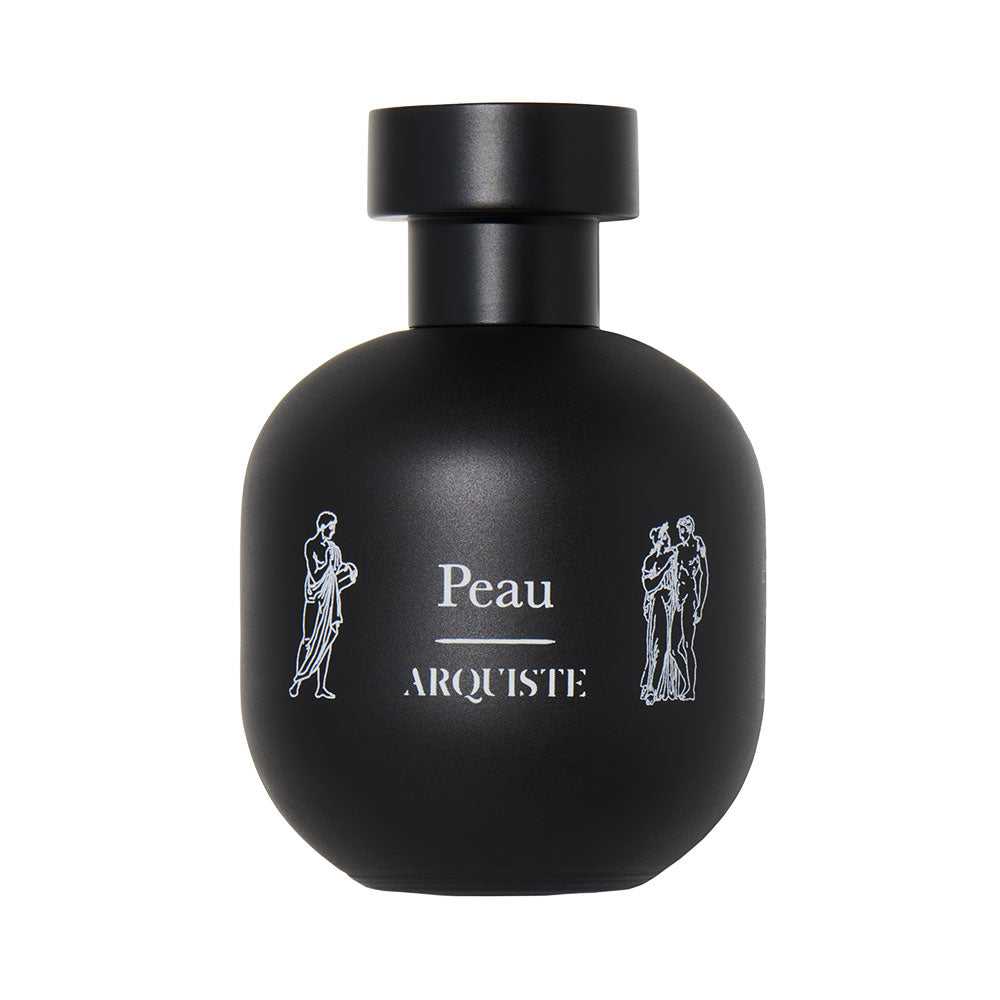 A black bottle of perfume labeled 'Peau' by ARQUISTE, with white illustrations of a figure and a building on the label.