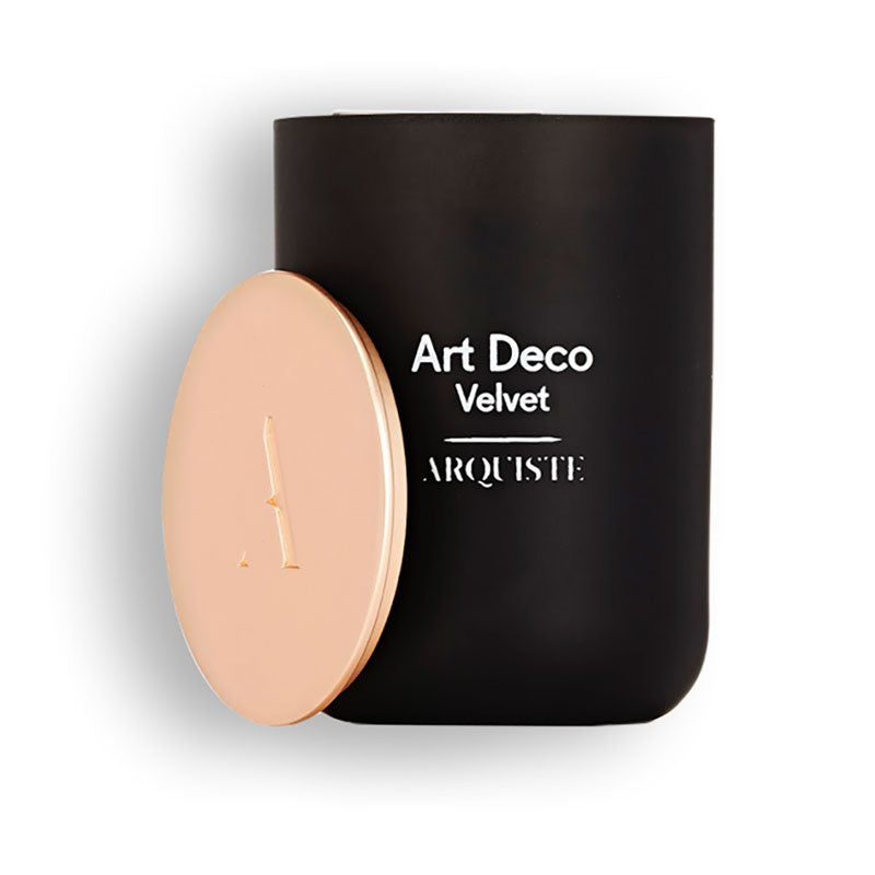 Black candle next to its lid
