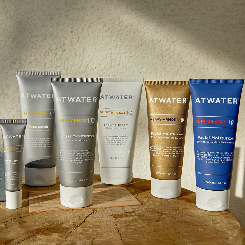 Atwater skin products on a wooden surface in front of a white textured background