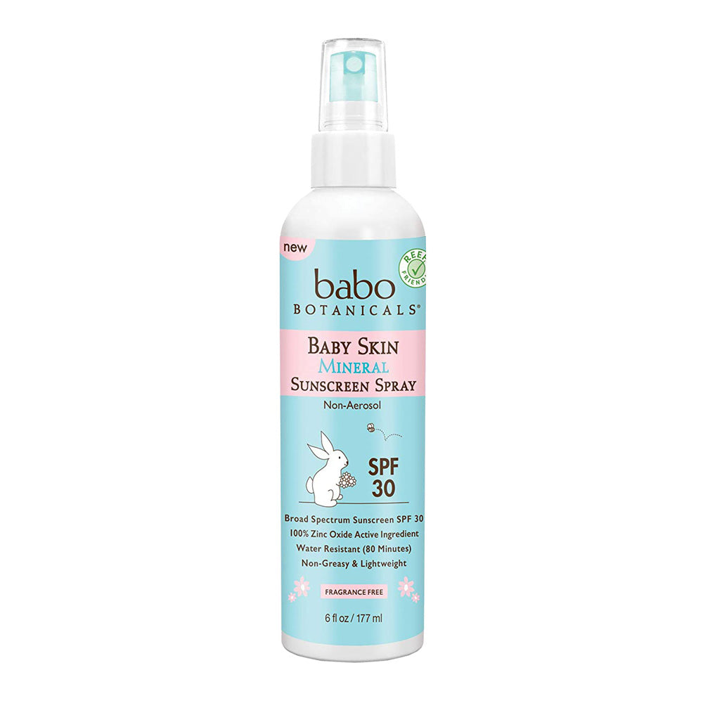 A pump spray bottle of Babo Botanicals Baby Skin Mineral Sunscreen Spray SPF 30.