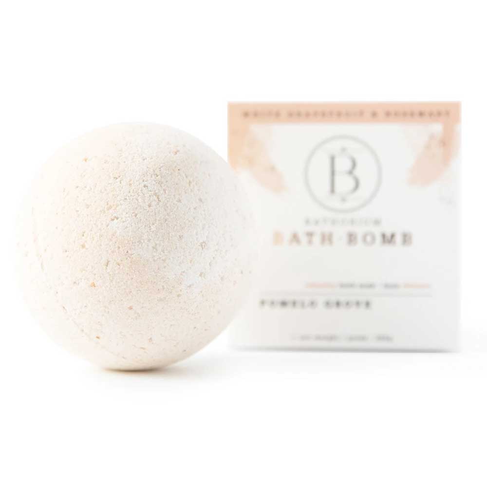 bath bomb pomelo grove next to its packaging