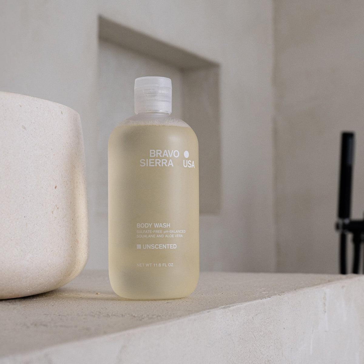 Bravo Sierra Unscented Body Wash on a concrete countertop.