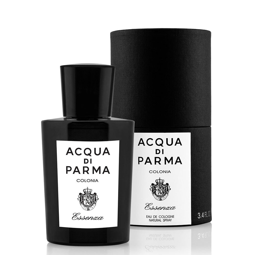 Acqua di parma Colonia Essenza's signature black bottle with the cylindrical signature black packaging     directly behind it.