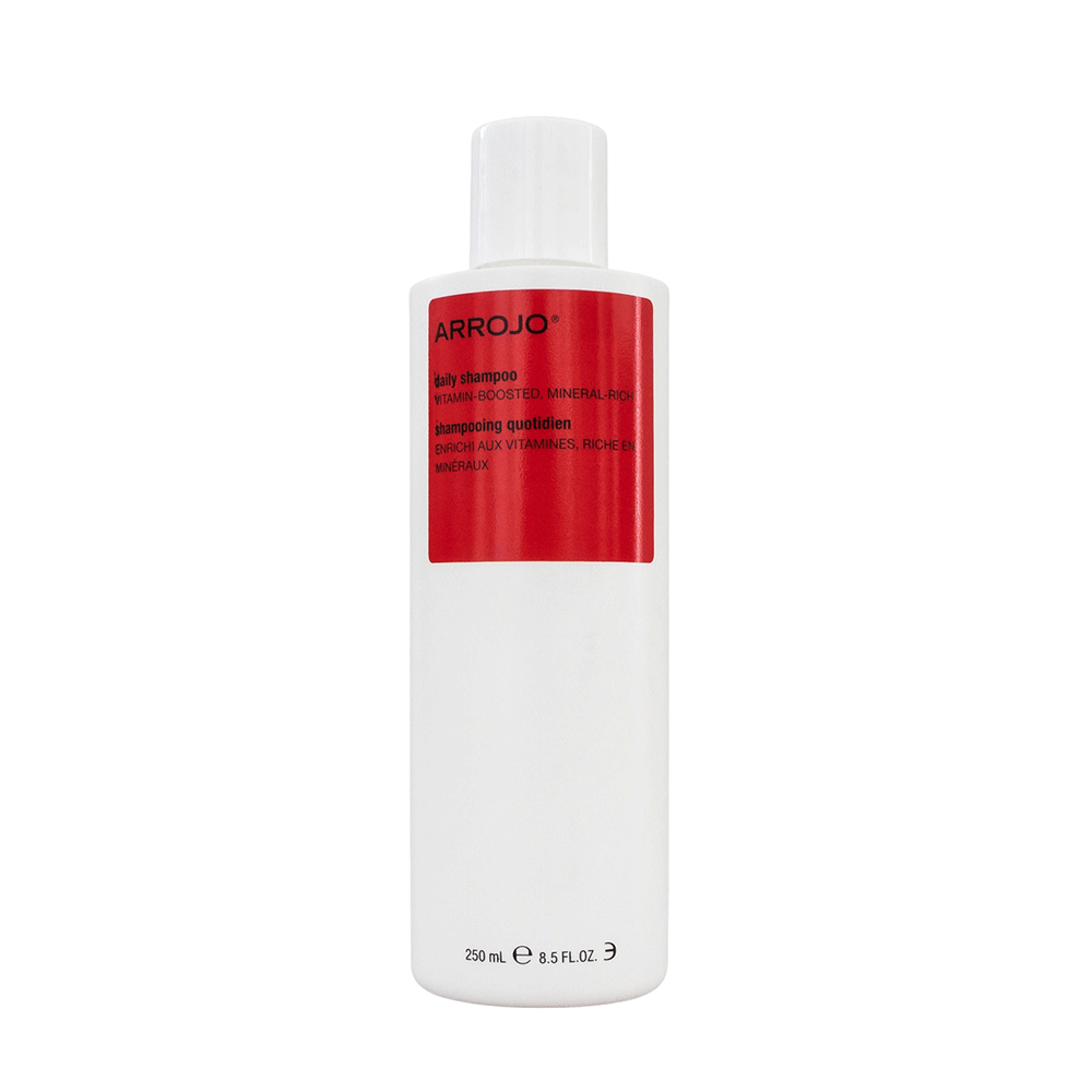 A white bottle of Arrojo daily shampoo with a red label, containing 8.5 fl oz / 250 ml of product.