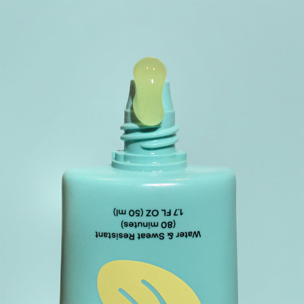 Bask Daily Invisible Gel SPF 40 sunscreen with product coming out of the tube