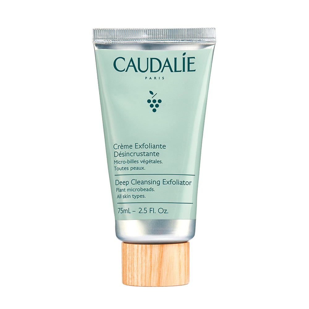 A tube of Caudalé Vinoclean Deep Exfoliating Cleanser with a green label and a wooden cap.