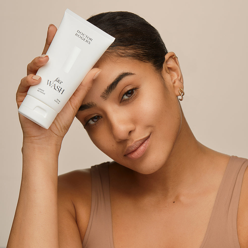 Woman holding Doctor Rogers Face Wash