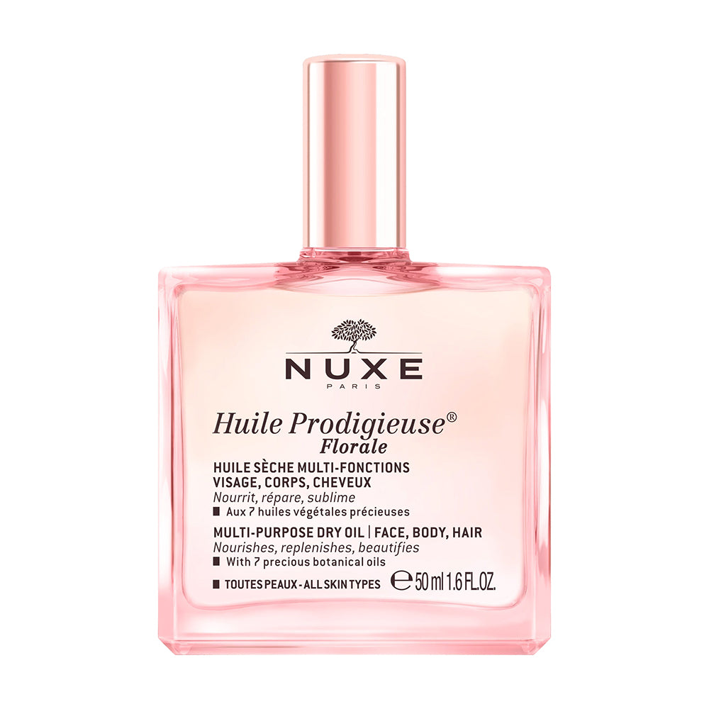 A bottle of NUXE Huile Prodigieuse Florale Multi-Purpose Dry Oil with a pink label and cap, against a white background.