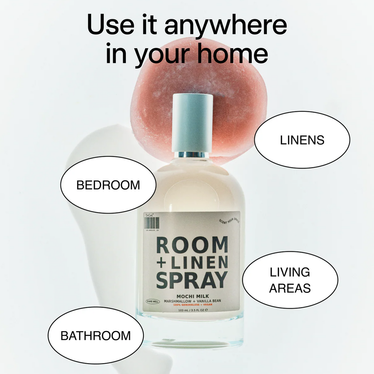 Room and linen spray bottle with usage tips on a light gray background