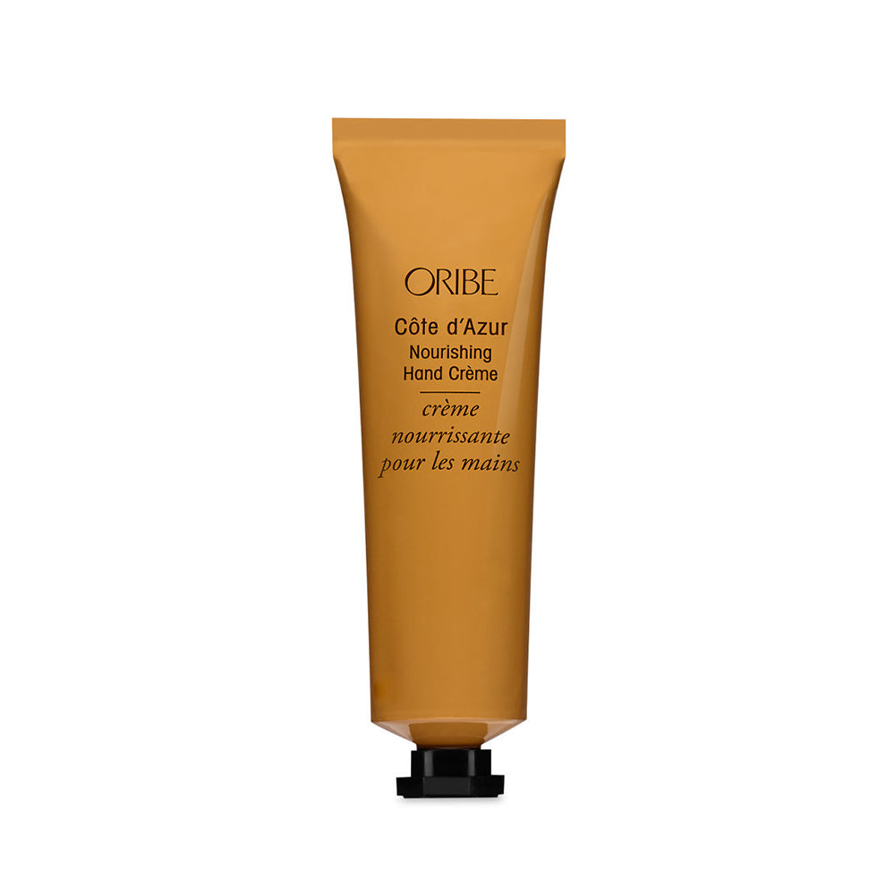 Oribe Cote d'Azur Nourishing Hand Cream tube.