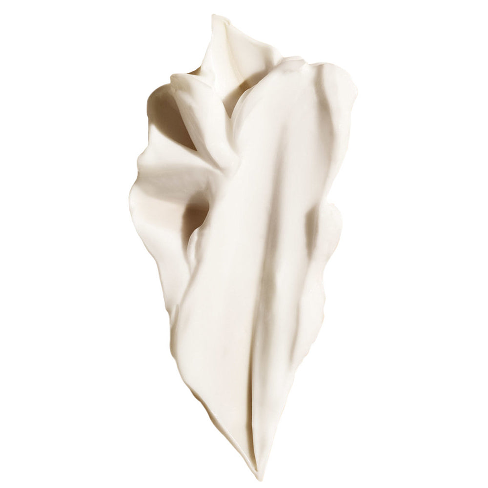 a dab of Oribe Cote d'Azur Nourishing Hand Cream shown on white background.