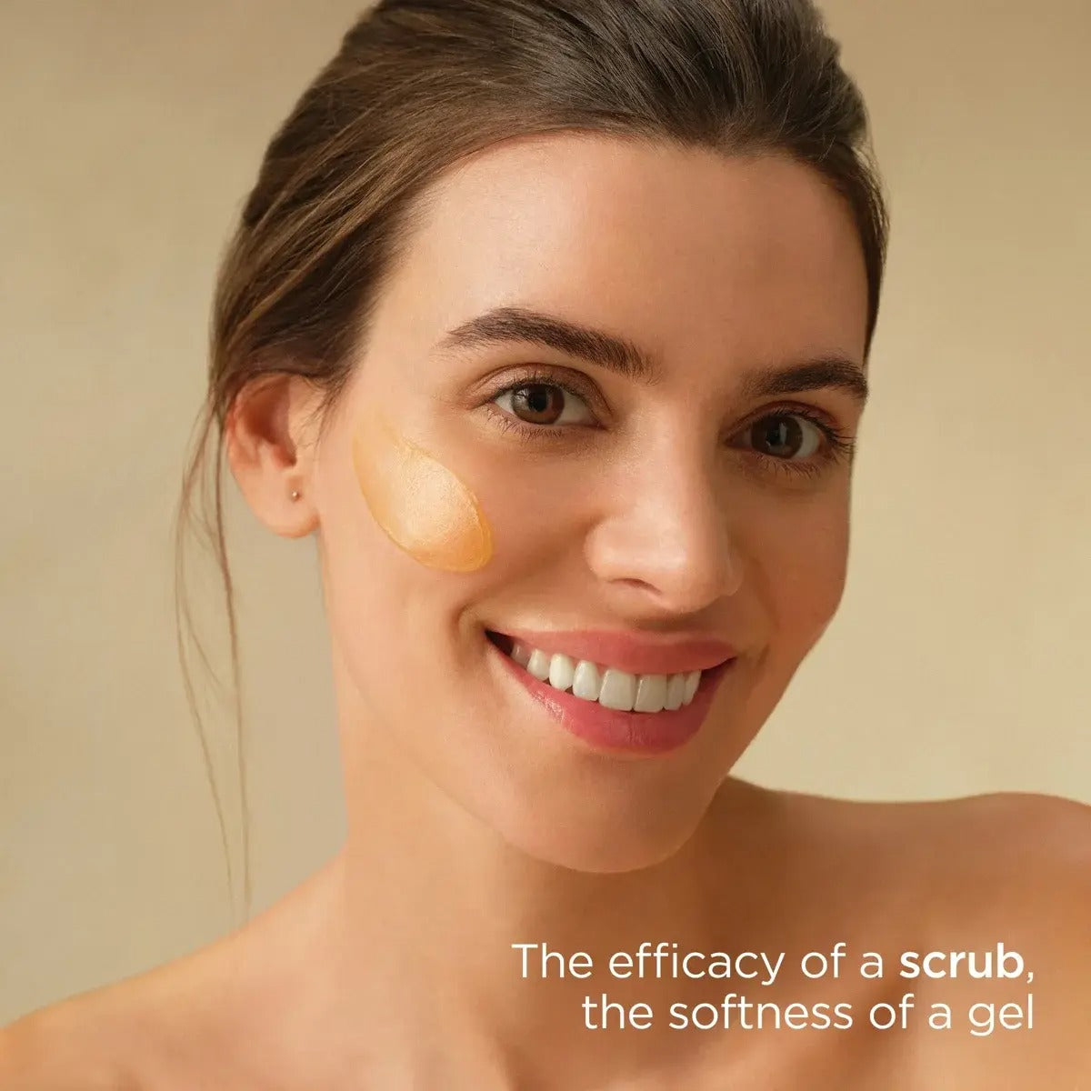 Woman with ISDIN ISDINCEUTICS Essential Scrub product applied to her face