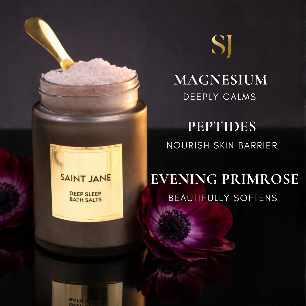 Jar of Saint Jane deep sleep bath salts with flowers on a dark background