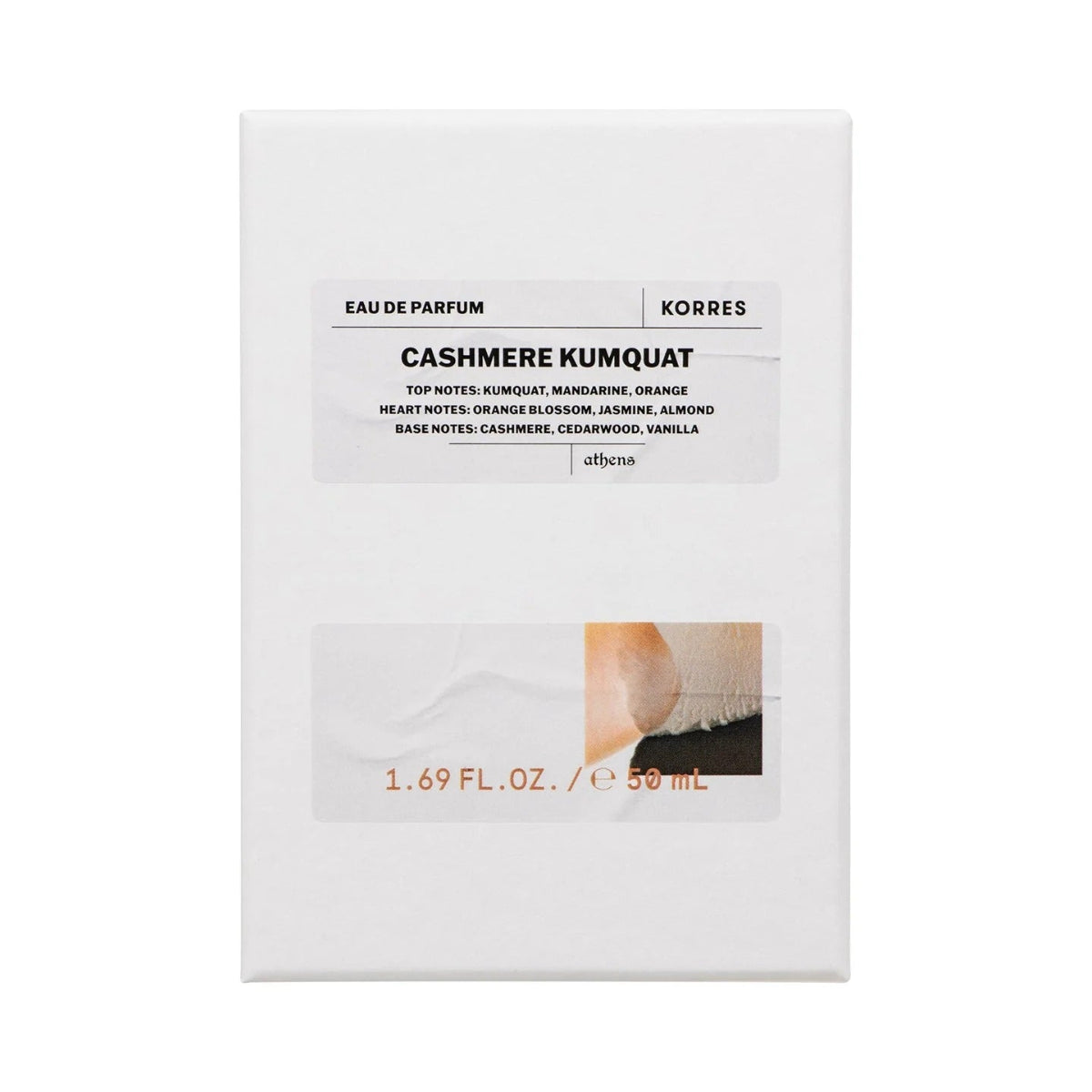 Korres Cashmere Kumquat perfume packaging on a white background