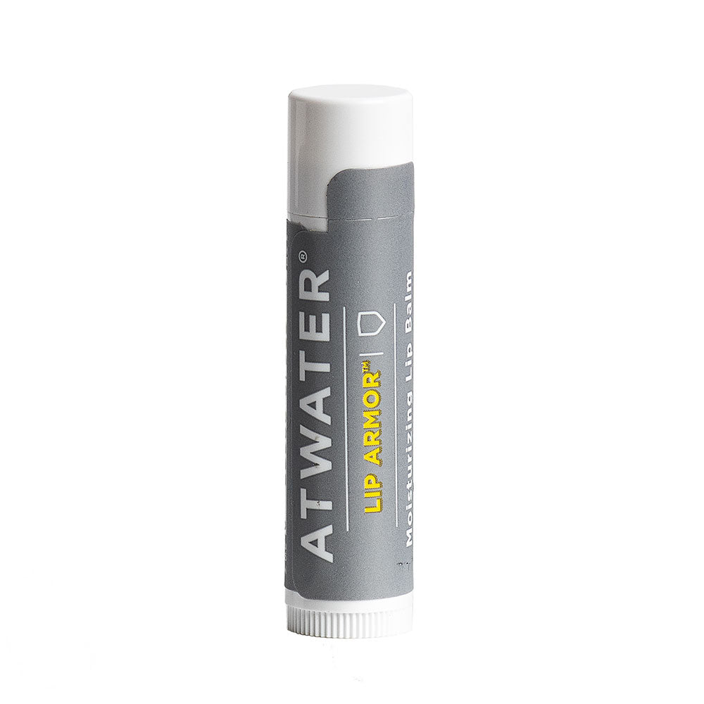 ATWATER Lip Armor Moisturizing Balm stick in white and grey packaging.