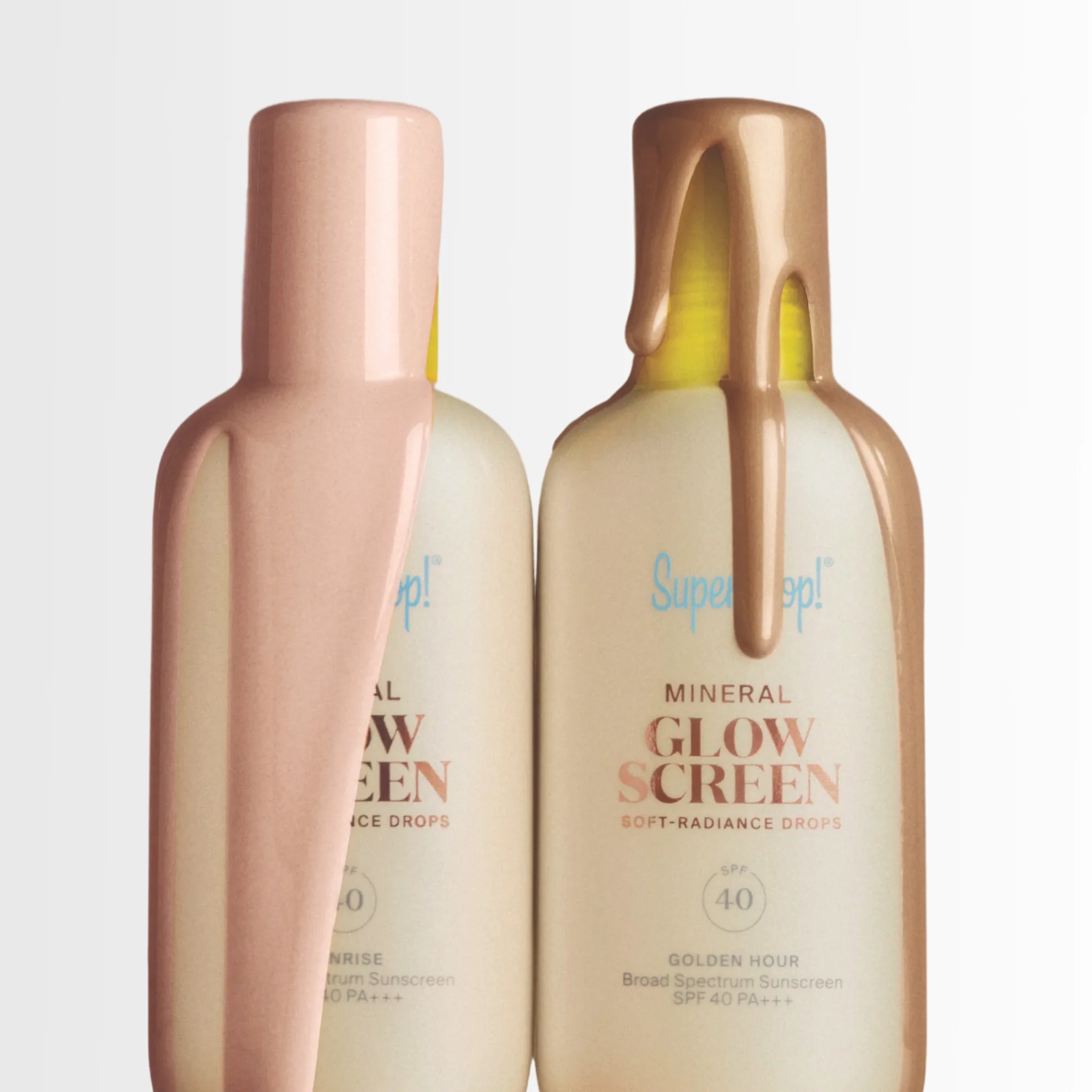 Two bottles of Supergoop! mineral glow screen sunscreen on a light gray background