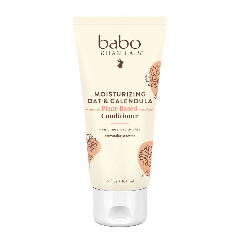 Tube of Babo Botanicals Moisturizing Oat & Calendula Conditioner with floral design