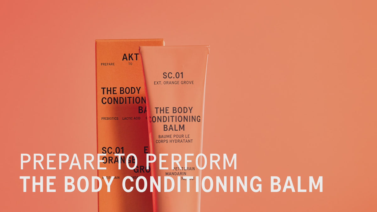 Video featuring AKT's Body Conditioning Balm. Video begins with people dispensing the balm onto their hands, then massaging it onto their shoulders, legs, and body.