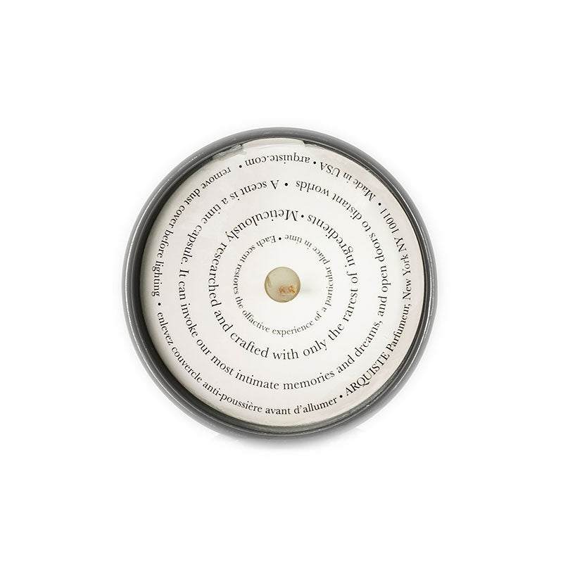 Top view of a candle with a cover on it
