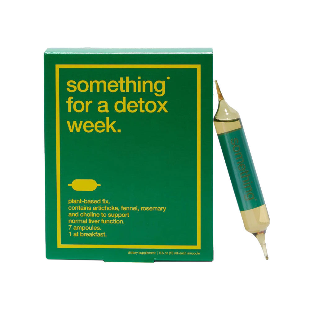 A green and yellow box labeled 'something for a detox week' with a single ampoule protruding from the box, set against a white background.