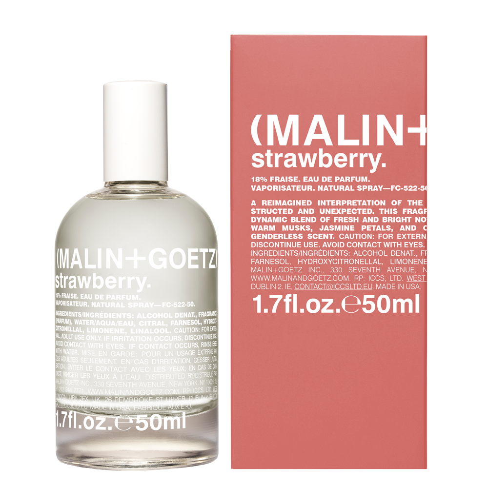 A bottle of Malin + Goetz Strawberry Eau de Parfum next to its pink and white cardboard packaging box, set against a plain white background.