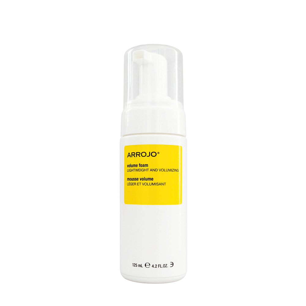 A white bottle with a pump dispenser labeled 'ARROJO Volumizing Foam', designed for hair care.